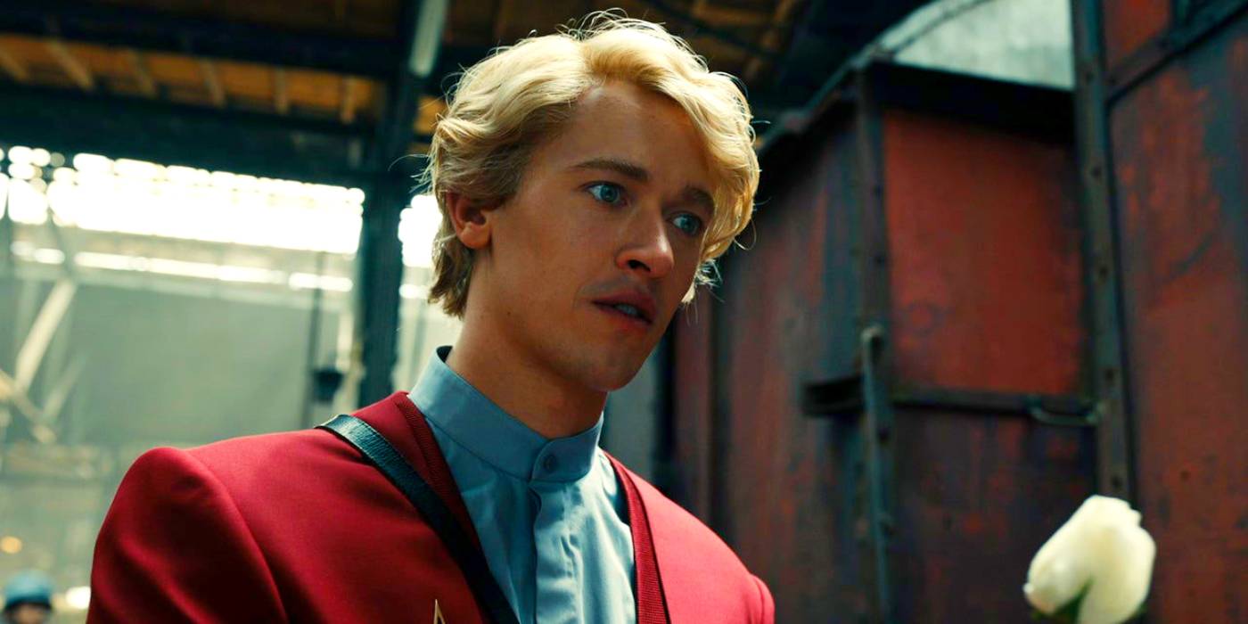 Изображение, на котором Королонус Сноу держит розу в "Песне соловьев и змей"