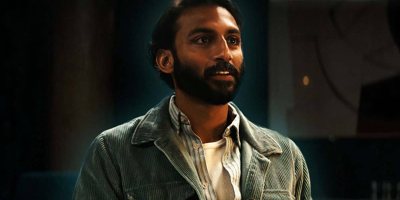 Эви Наш в роли Лукаса Кайла, улыбающийся в сериале «Silo»