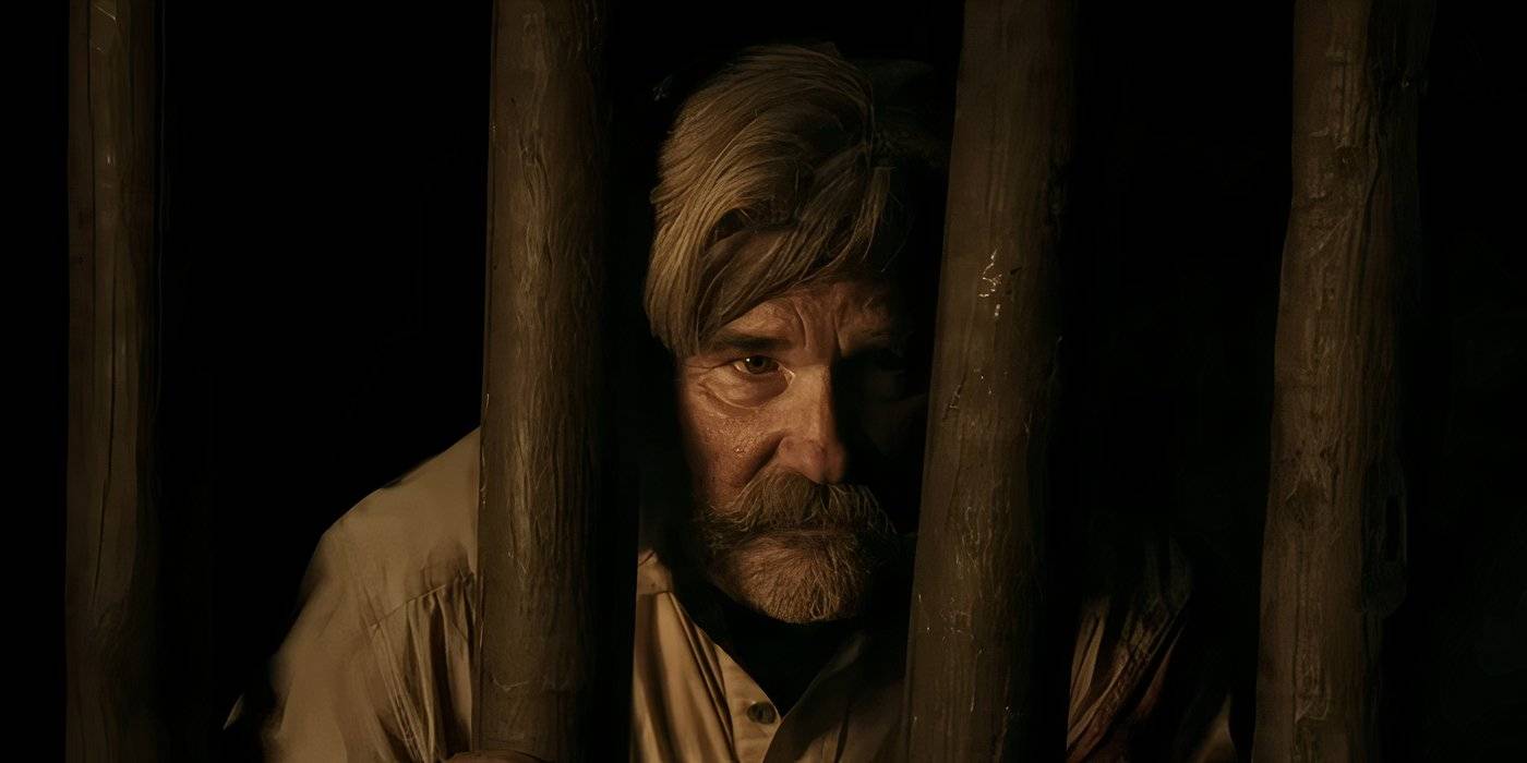 Курт Рассел, смотрящий через деревянные решетки в "Bone Tomahawk"