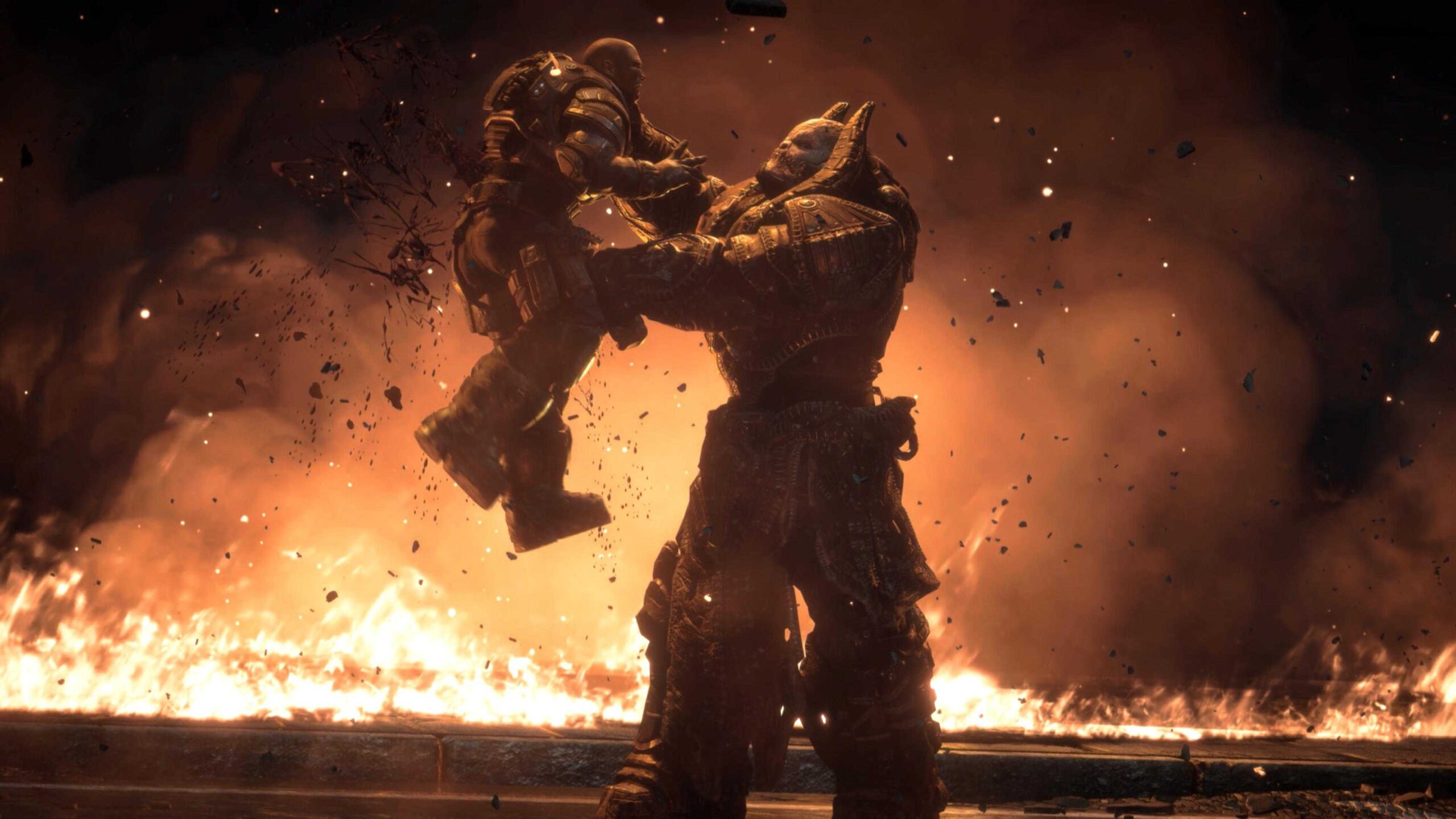 Генерал RAAM держит лейтенанта Ким на земле и вонзает ему бензопилу в Gears of War: Reloaded.