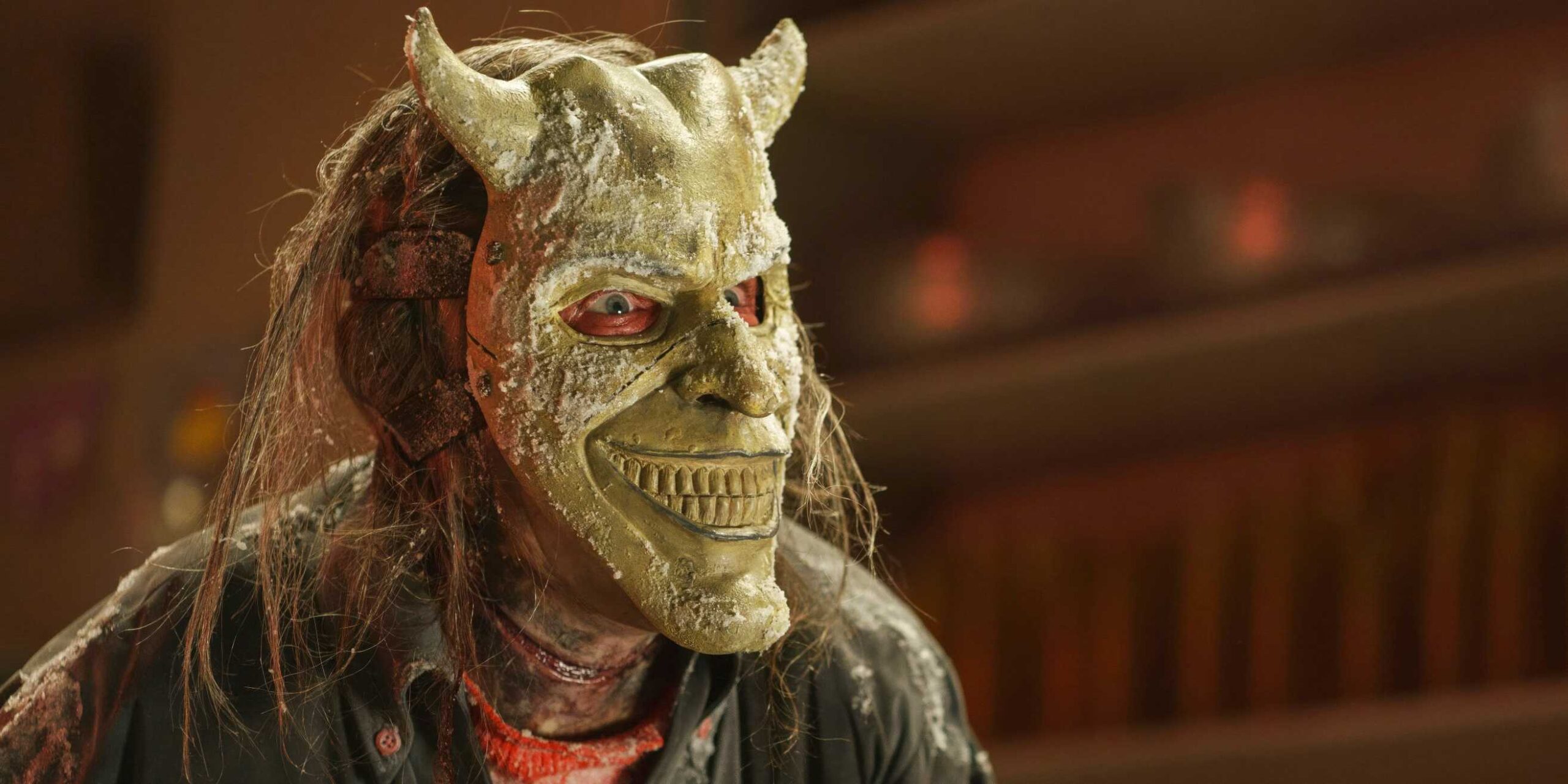 The Grabber с его улыбающимся маской в Black Phone 2