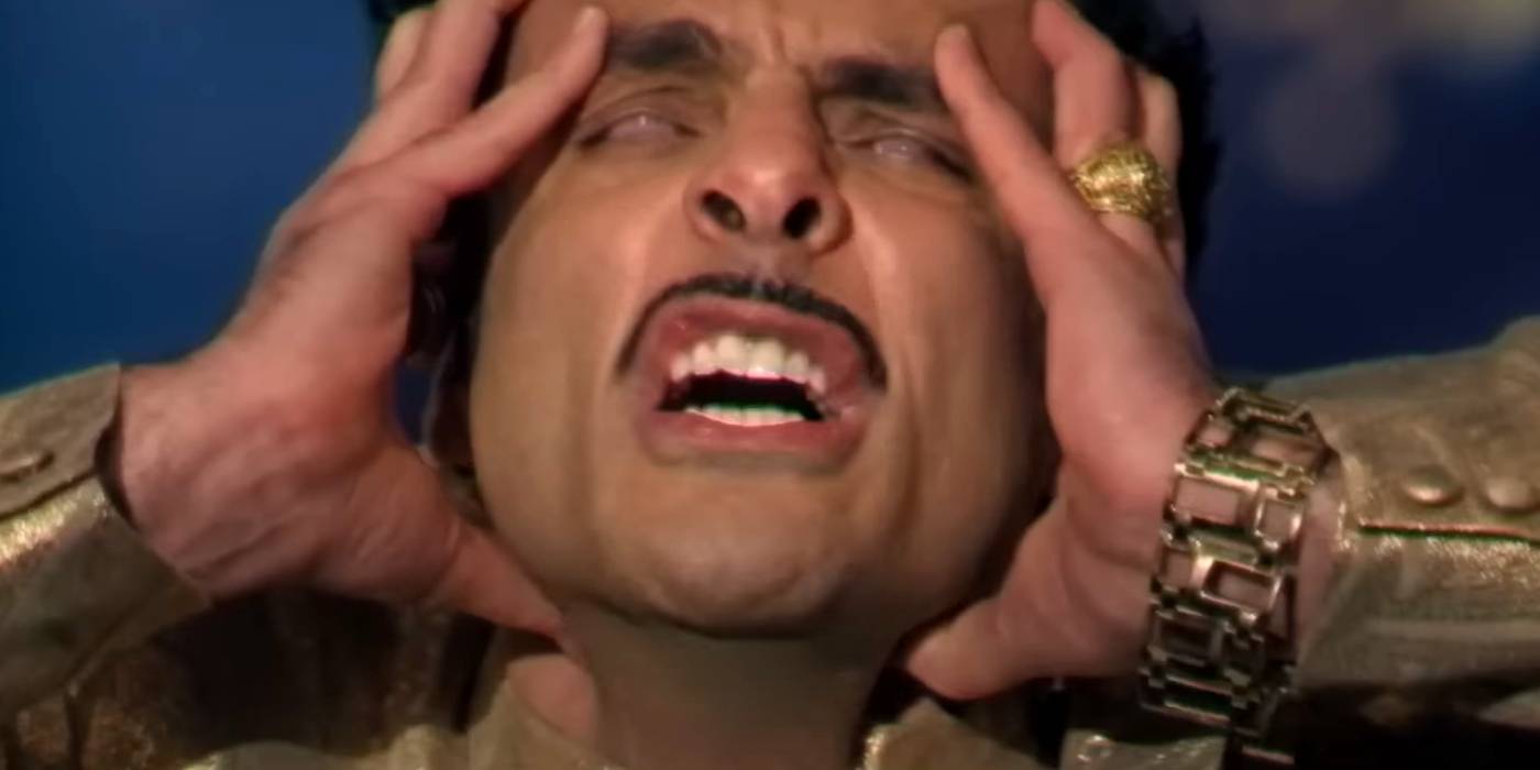 Человек с белыми глазами, сжимающий голову в "Late Night with the Devil"