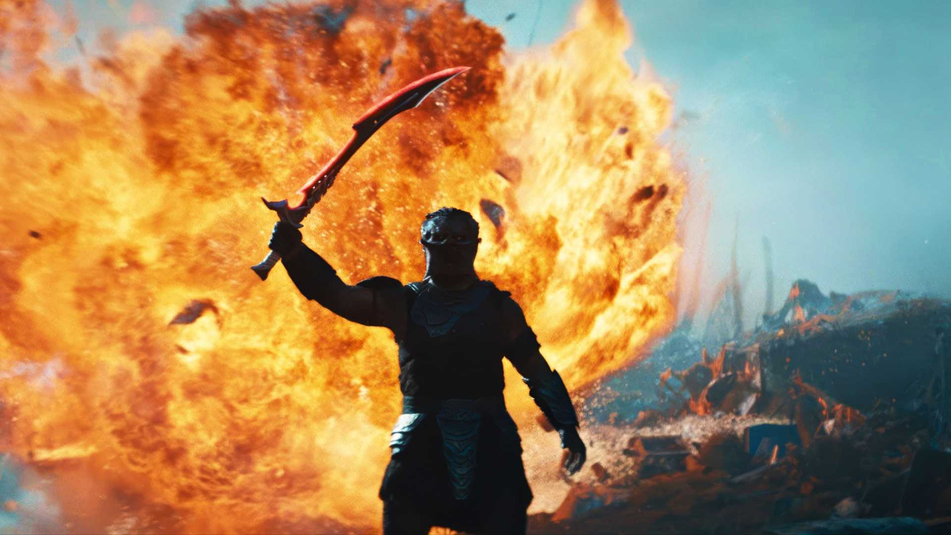 Предатор, силуэт которого виден на фоне взрыва в фильме "Predator: Badlands"