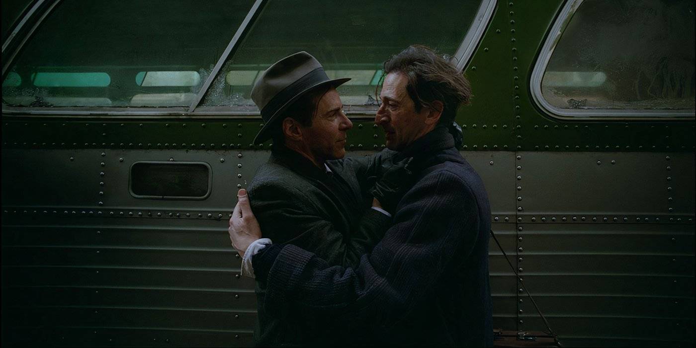 Адриен Броди и Алессандро Нивола обнимаются на одной из фотографий из "Брутализма"