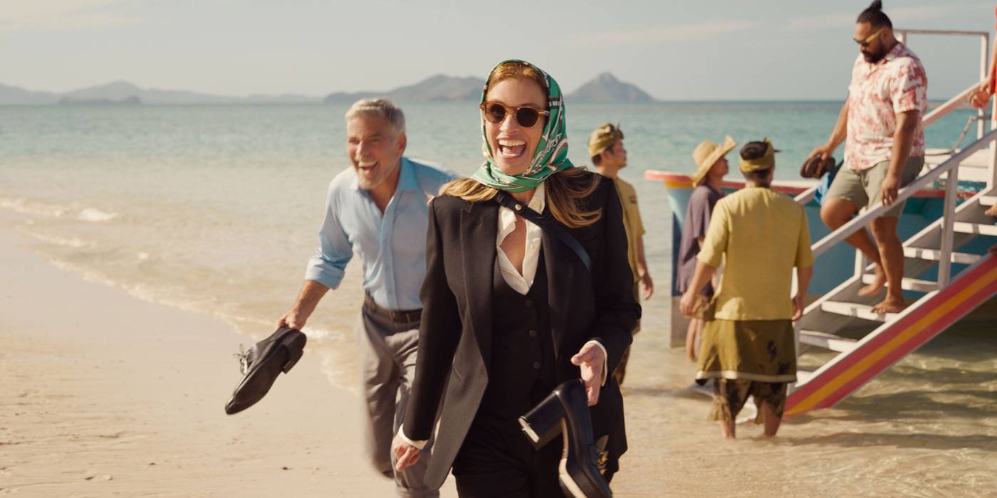 Джорджи и Дэвид на песке в фильме "Билет в рай"