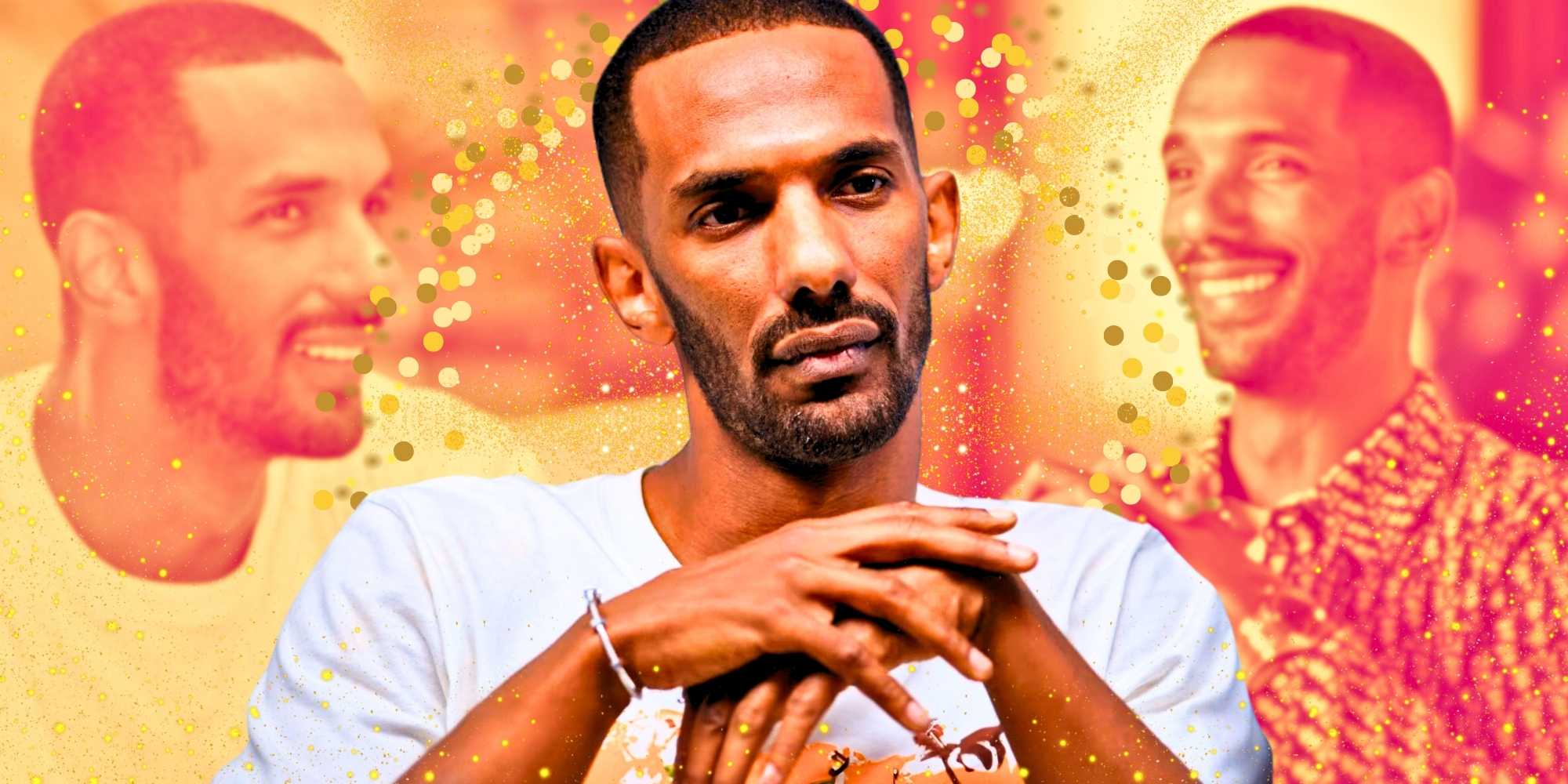 Хассан Эламин из Dubai Bling, стоящий с руками вместе, не улыбается, желтый и оранжевый фон