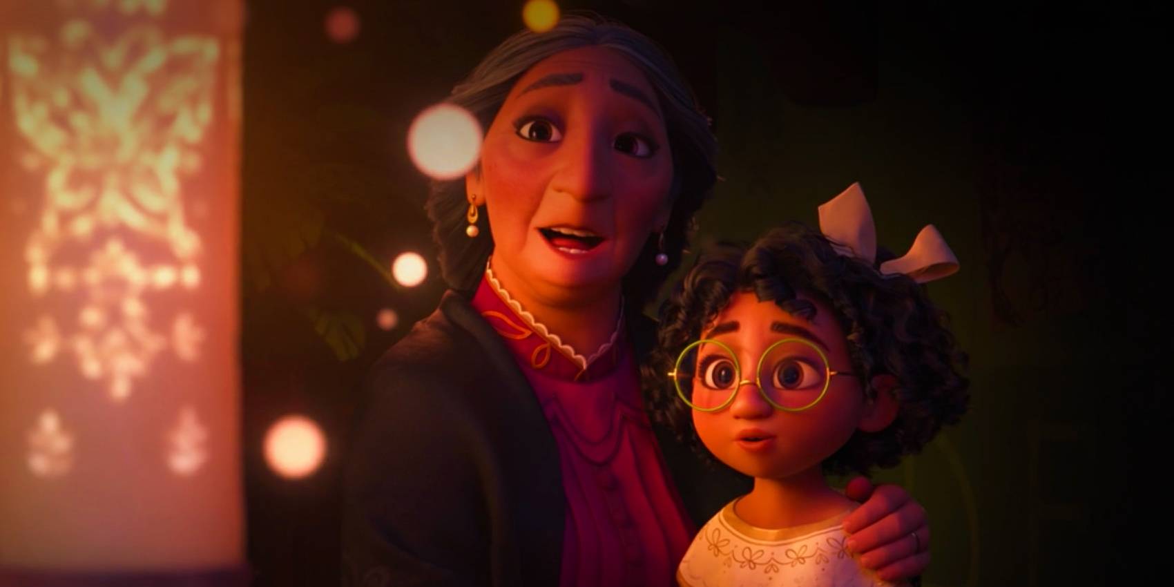 Encanto Abuela Alma And Young Mirabel Looking At Candle