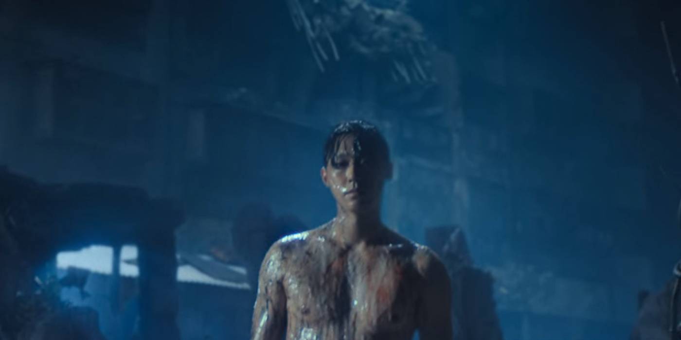 Eun-hyuk emerging from the wreckages of the Green Home at the end of Sweet Home season 2, episode 8