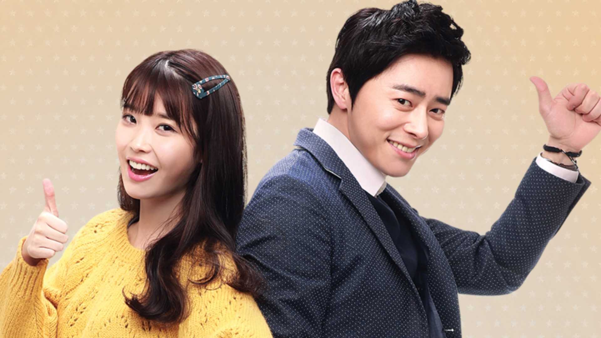 Мужчина и женщина, показывающие пальцы вверх в *You Are the Best!*