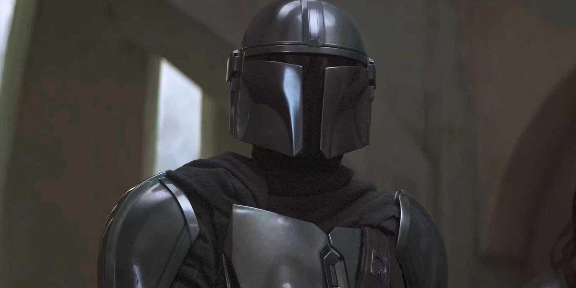 Дин Джарин смотрит из канты в Неварро после прибытия Моф Гидеона.