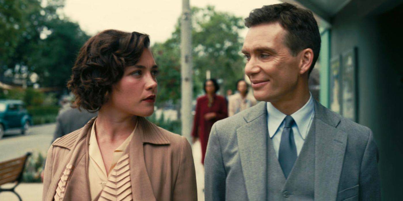 Флоренс Пью и Киллиан Мёрфи в роли Джин Татлок и Дж. Роберта Оппенгеймера, идущих по улице