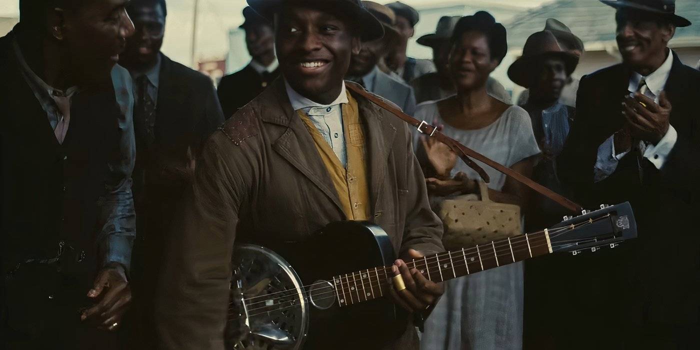 Человек, держащий гитару в "Грешниках"