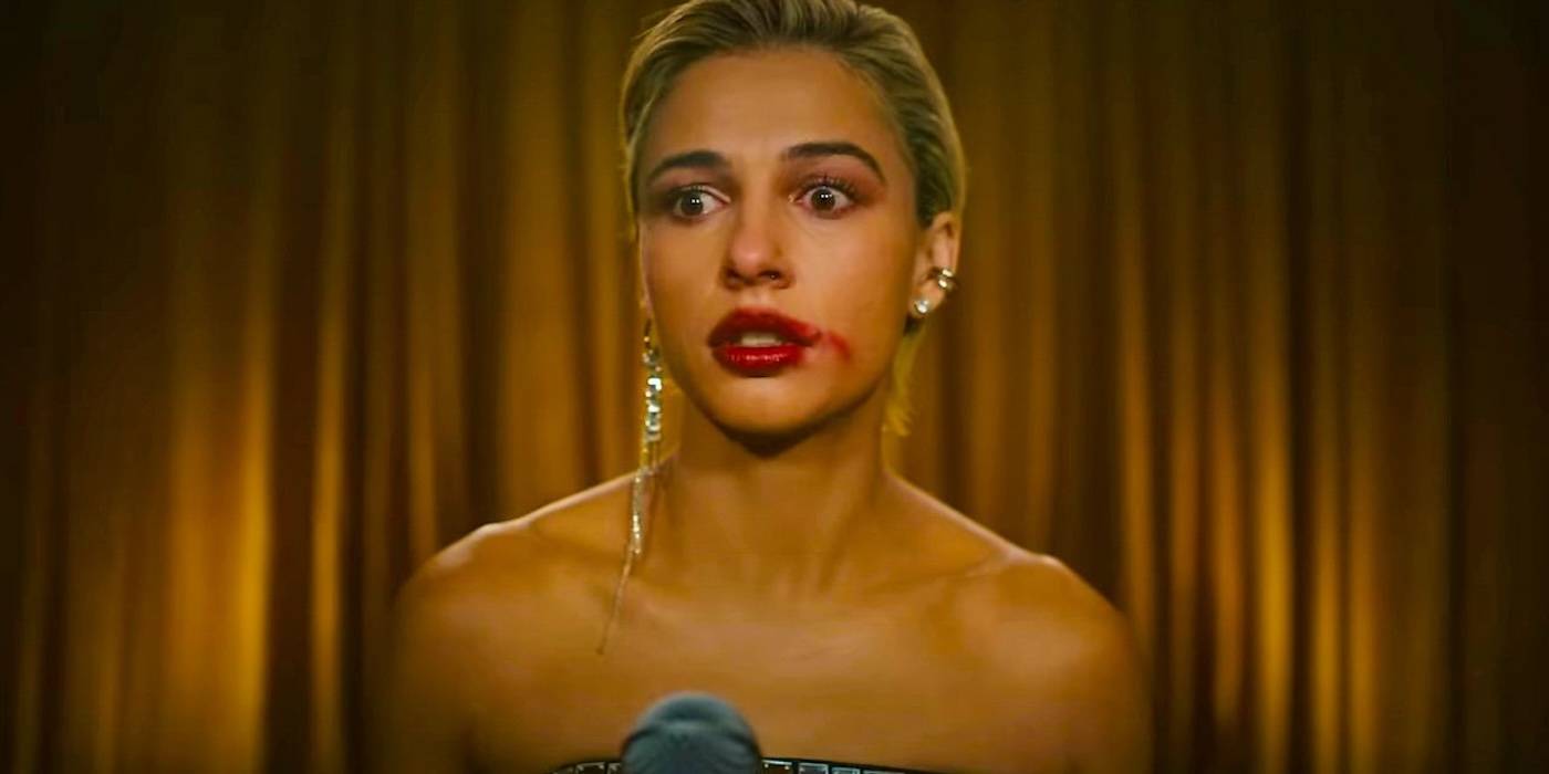 Наоми Скотт в роли Скай, выглядящей шокированной с размазанной помадой в "Smile 2"