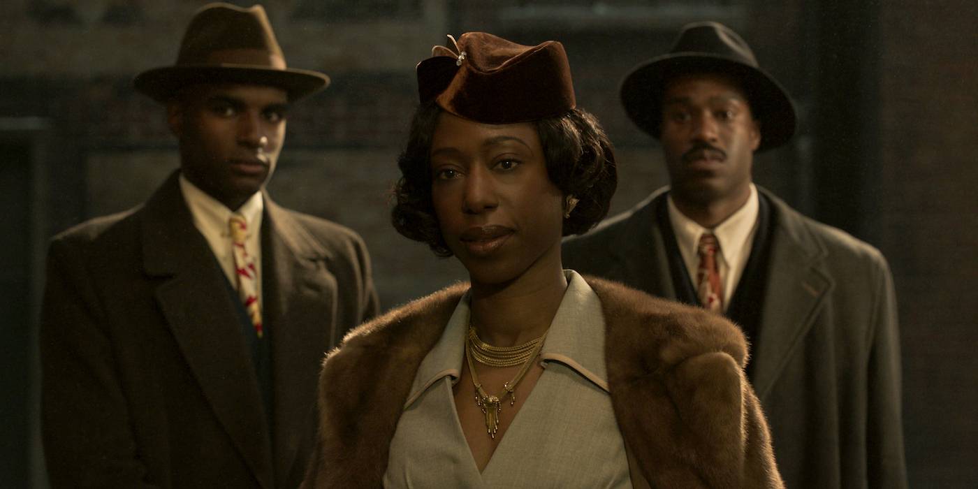 La Fontaine с двумя телохранителями в фильме "The Outfit"