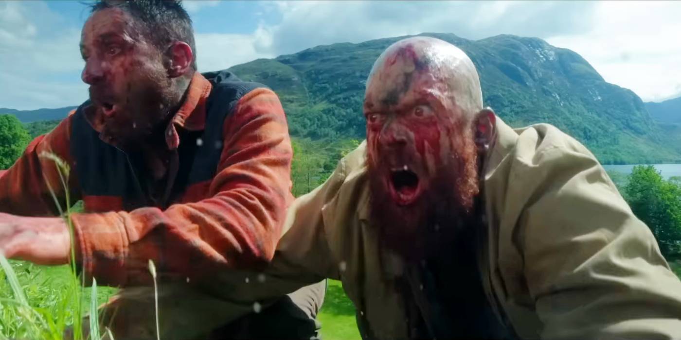 Два зараженных, рычащих на вершине холма в фильме "28 дней спустя"