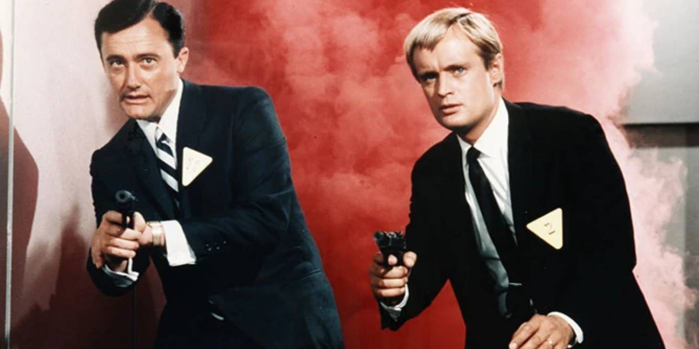  Роберт Ваун как Наполеон Соло и Дэвид Маккаллум как Илья Курякин в фильме *The Man From UNCLE*.