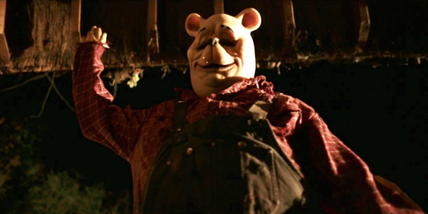 Винни Пух машет в фильме "Кровь и Мед".