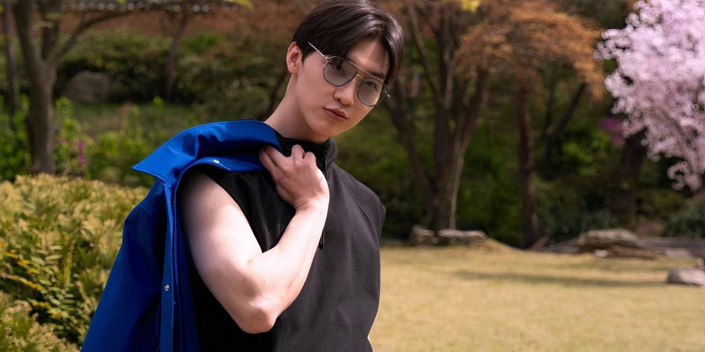 Мин Хо смотрит вдаль, с курткой через плечо в XO, Kitty