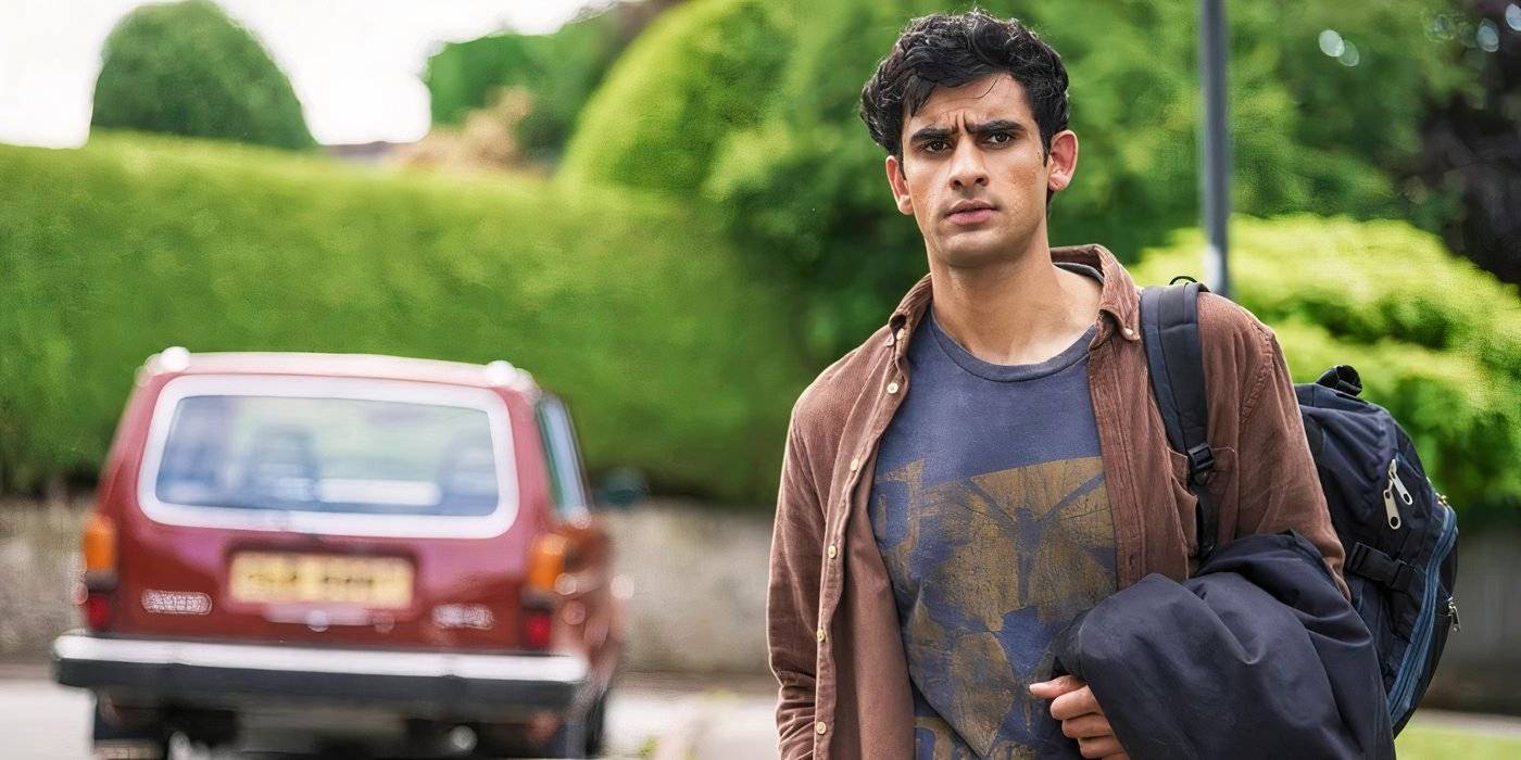 Zain Iqbal as Ravi Sing in A Good Girl's Guide to Murder walking past a car